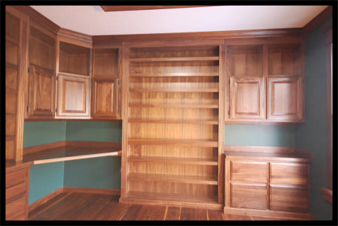 56-inch Wide Solid Walnut Bookcase with Reinforced Nosing, Fluted Moldings, and Raised Panel Drawer Bank - No Particle Board